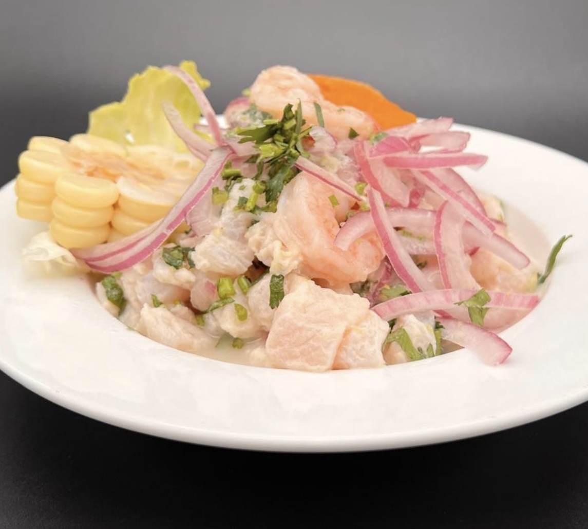 Colorful ceviche dish on white plate